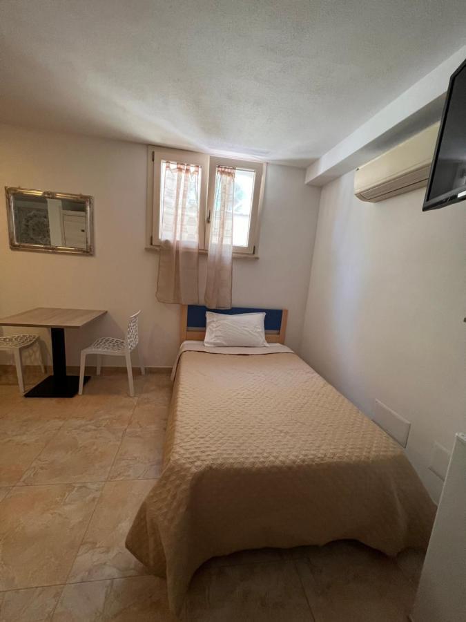 Hotel Rena Bianca House Porto Torres Exterior foto